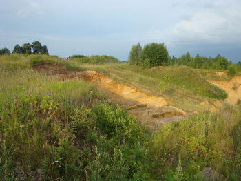 Scenic view of land against sky