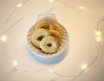 High angle view of cookies served on table