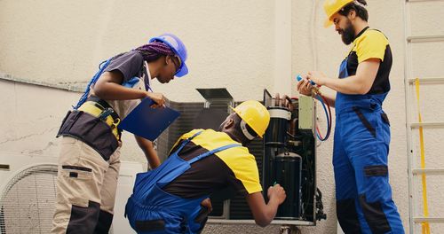 Side view of man working at construction site