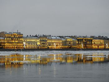 River by city against clear sky