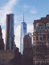 Low angle view of modern buildings against sky