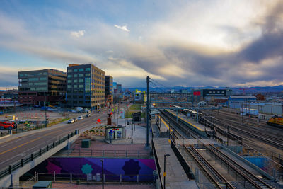 High angle view of train in city against sky