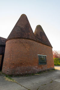 Low angle view of old building against sky