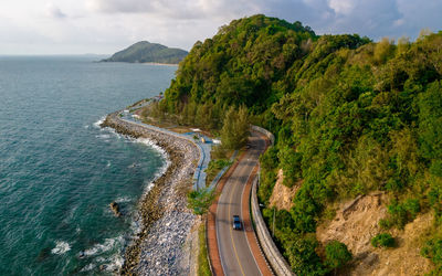 High angle view of sea against mountain