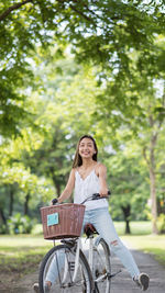 Portrait of woman riding bicycle