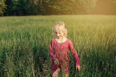 Woman standing on field