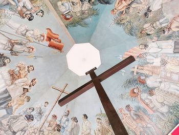 High angle view of cross on ceiling