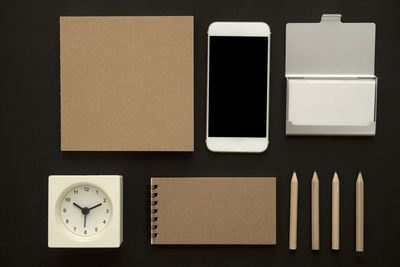 Close-up of clock on table