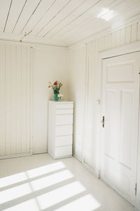 Flower vase on door