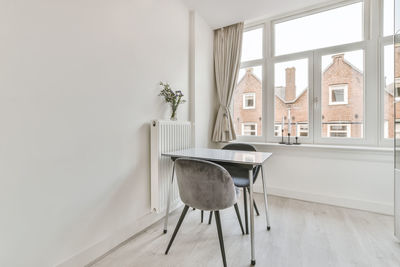 Empty chairs and table at home