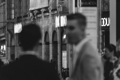 People walking on street in city