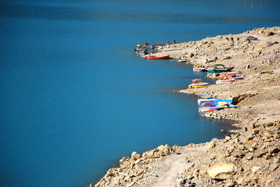 High angle view of beach against blue sky