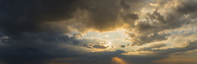 Low angle view of clouds in sky during sunset