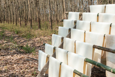 Row of white fence on field