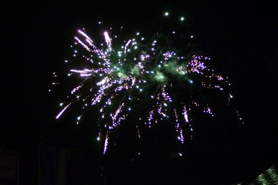 Firework display at night
