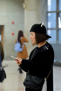 Side view of a woman looking away