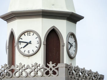 Low angle view of clock on building