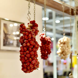 Close-up of fruits hanging on display at store