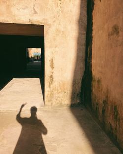Shadow of man on wall