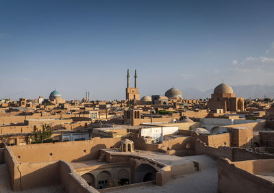 View of buildings in city against sky