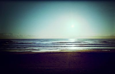 Scenic view of sea at sunset