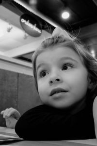 Close-up portrait of girl at home