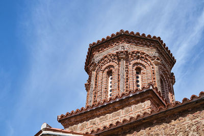 Low angle view of old orthodox church against sky