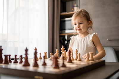 Boy playing chess