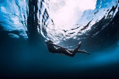 Man swimming in sea