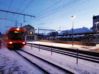 Train at railroad station during winter