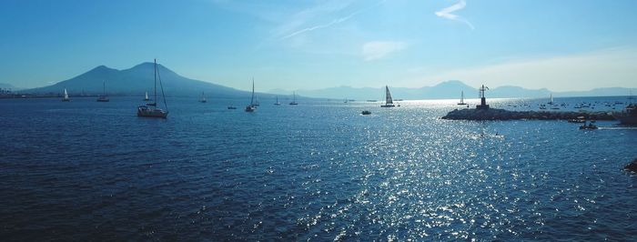 Scenic view of sea against blue sky