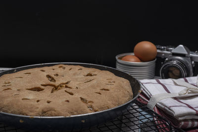 High angle view of breakfast on table against black background