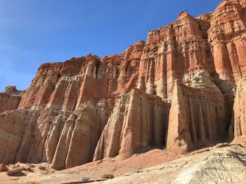 Low angle view of rock formation against clear sky