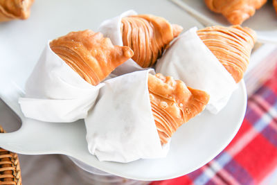 High angle view of bread in plate on table