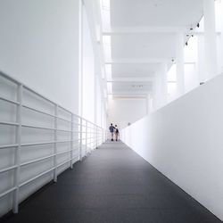 Woman walking in corridor