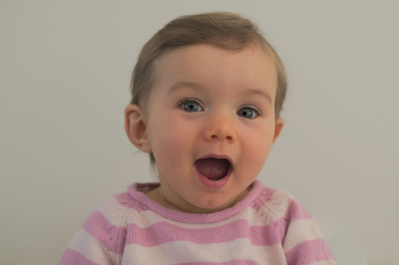 childhood, portrait, looking at camera, cute, babyhood, innocence, close-up, toddler, front view, baby, lifestyles, human face, white background, studio shot, person, new life, focus on foreground