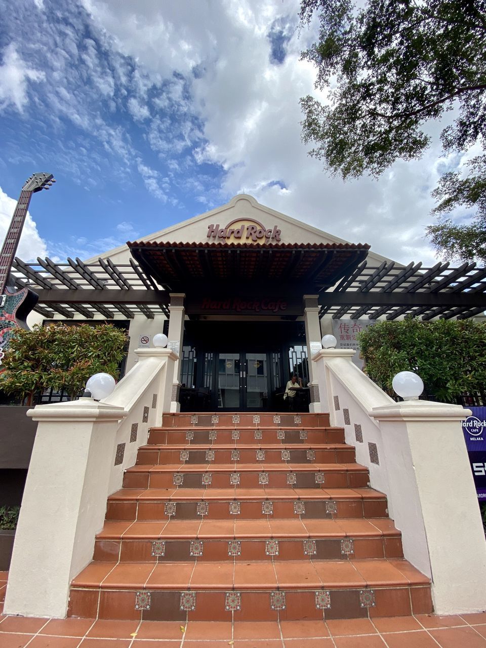 LOW ANGLE VIEW OF ROOF AND BUILDINGS AGAINST SKY