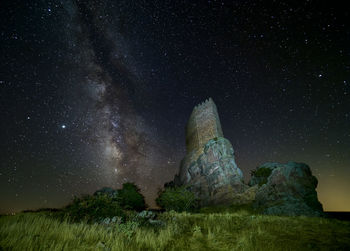 Zafra castle, with the milky way behind, guadalajara, spain