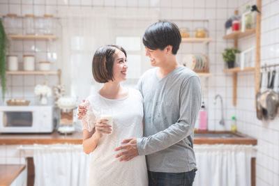 Couple standing outdoors