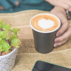 Coffee cup on table