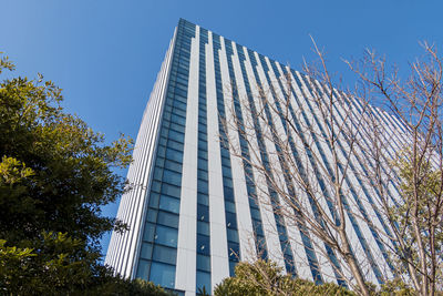 Low angle view of modern building against sky