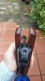 Close-up of photographer photographing camera