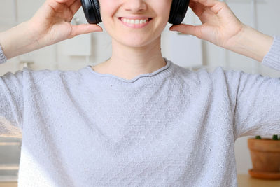 Portrait of young woman looking away