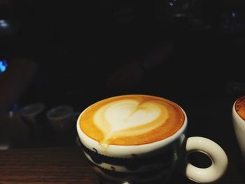 Close-up of cappuccino on table