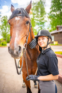 Rear view of man riding horse