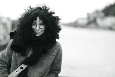 Portrait of smiling young woman in winter outdoors