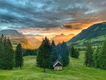 Scenic view of mountains against sky during sunset