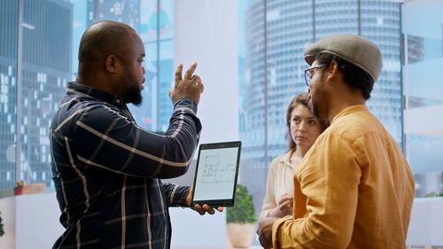 Side view of man using digital tablet