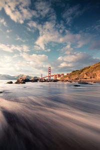 Golden gate bridge low angle long exposure ocean