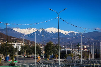 View of mountain range against blue sky